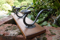 Vintage Hand Forged Wrought Iron and Wood Pigtail Hat / Coat Hooks